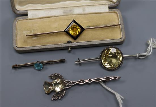 Four assorted gem set bar brooches including 9ct gold and Scottish silver.